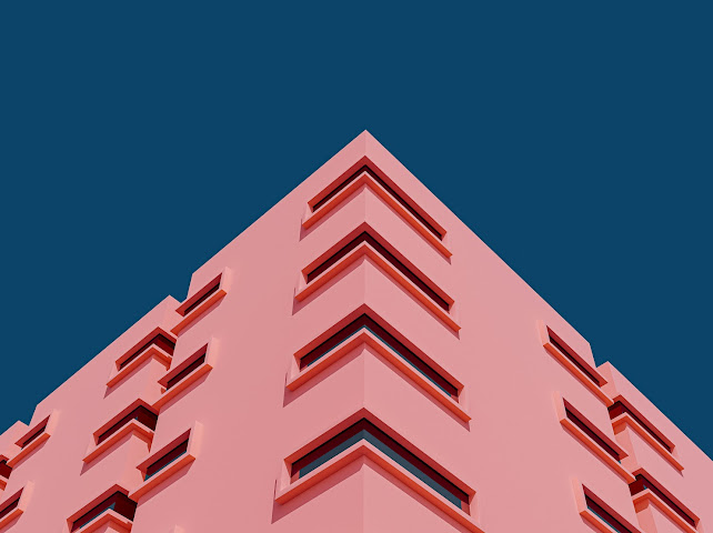 Pink building representing Employer Advisory